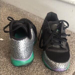 Silver and Black Athletic Sneakers Nike